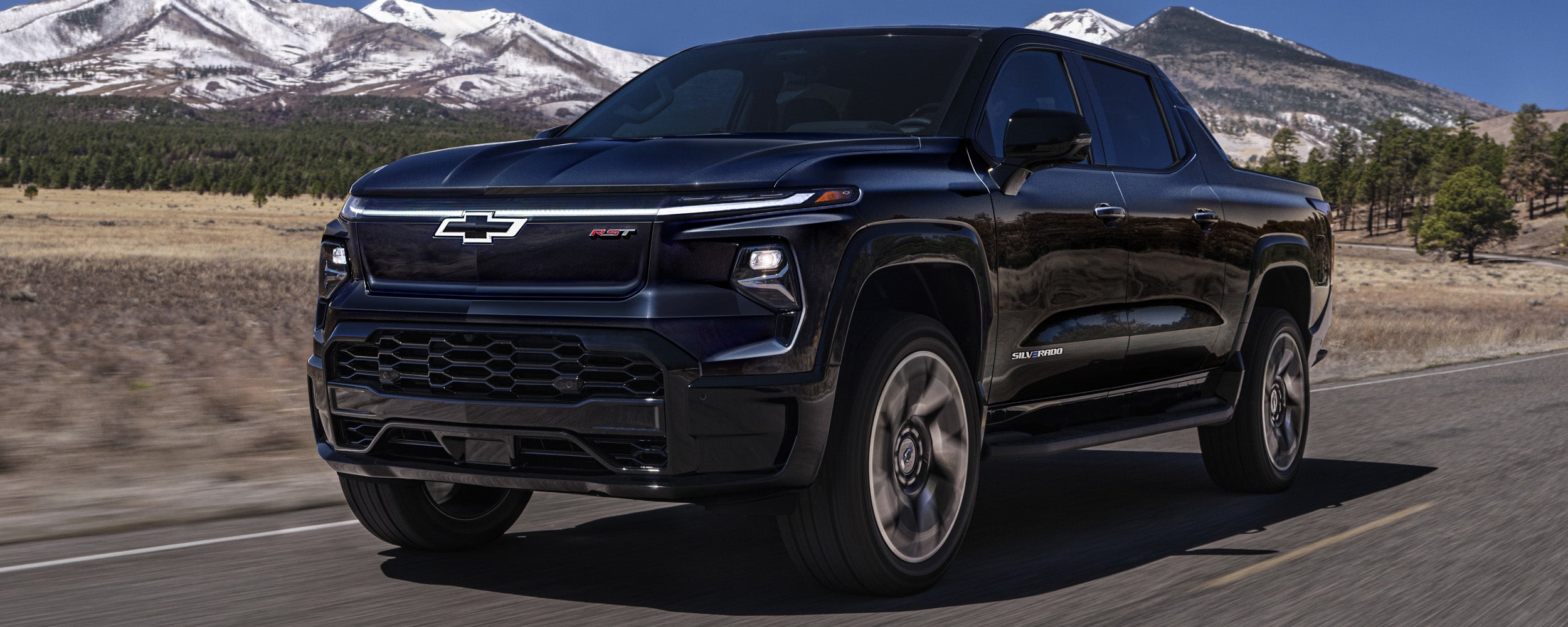 Dark blue chevy ev truck